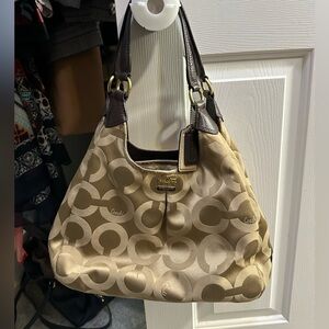 Tan and chocolate Coach purse